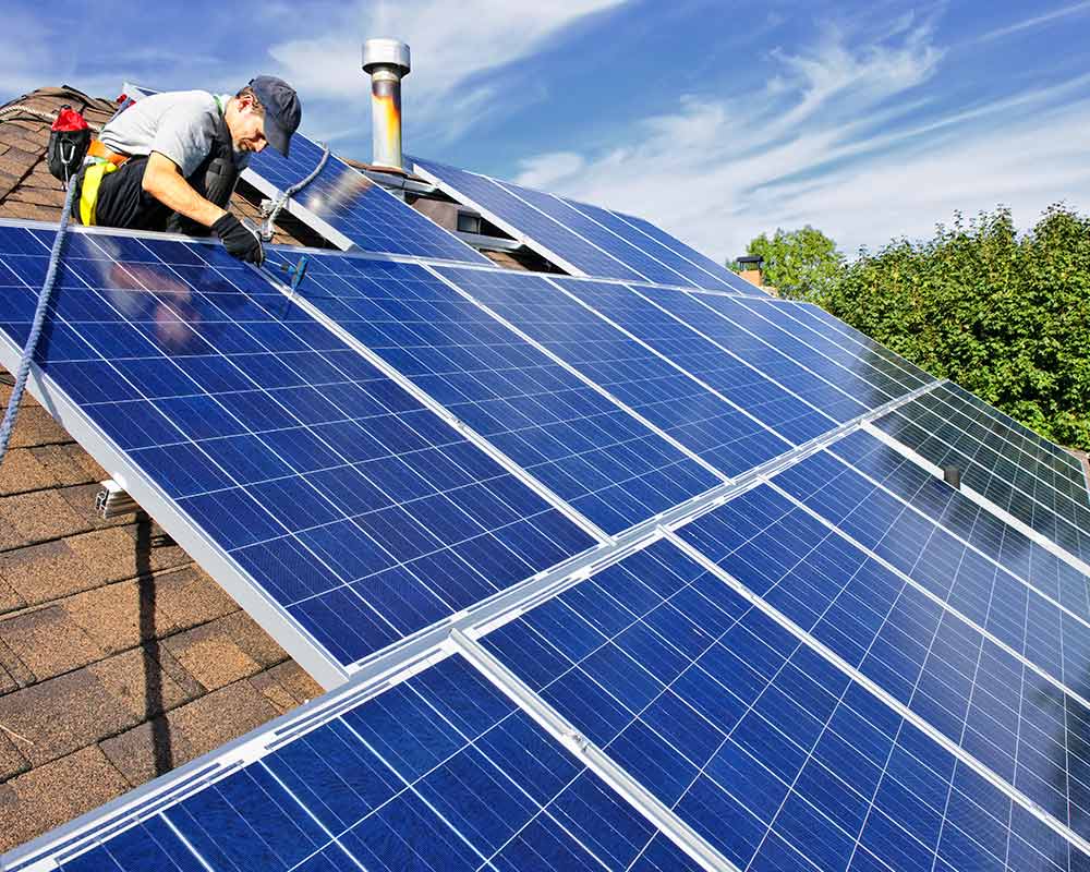 contractor installing solar panels on residential roof georgetown tx